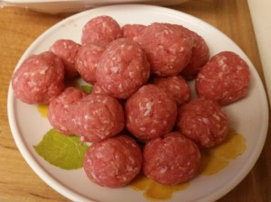 uncooked meatballs