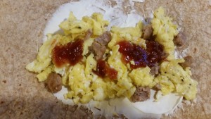 egg and cream cheese breakfast burrito inside