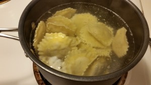 chicken ravioli with parsely pecan pesto - cooking
