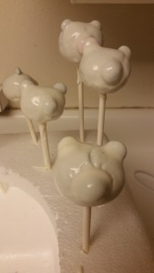 polar bear cake pops - coated drying
