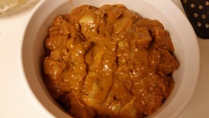 chicken tikka masala - raw chicken in dish